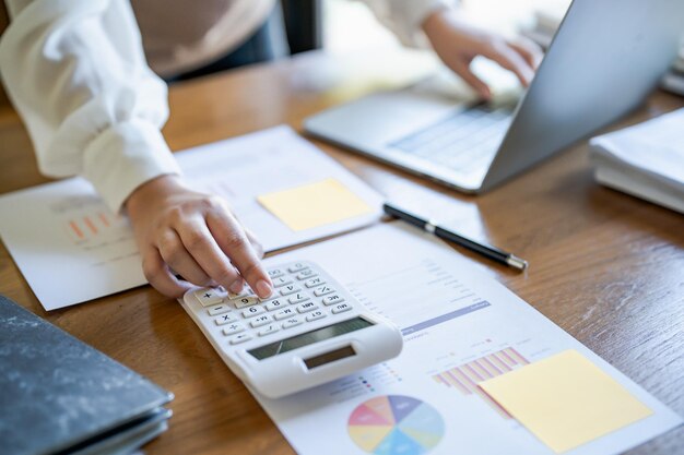 calculating-cost-economic-budget-saving-investment-concept-analyzing-investment-charts-calculator-accounting-concept_1715-10761
